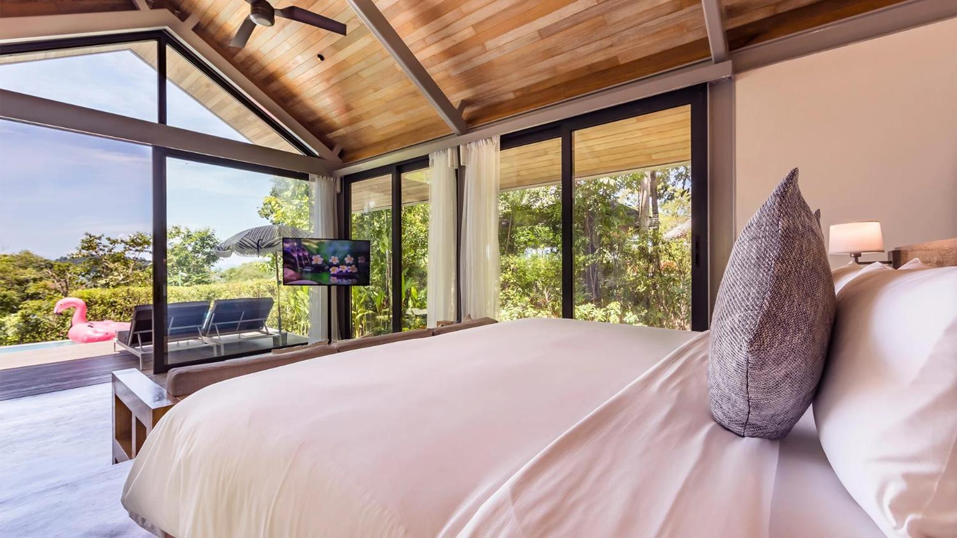 Hotel Island Escape Burasari Phuket Pokoj fotografie A bedroom at the hotel